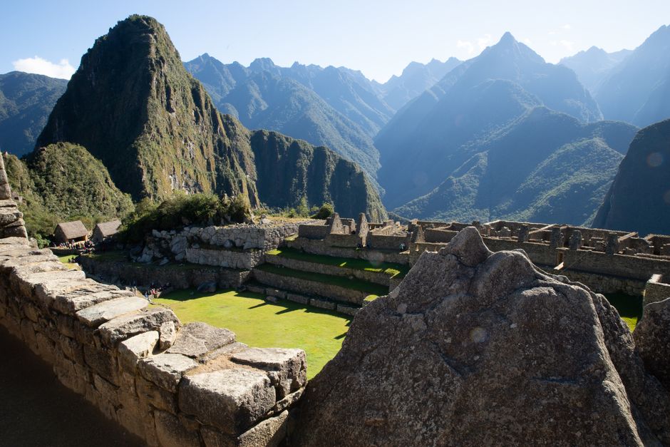 Explore the ancient ruins of Machu Picchu nestled in the scenic Andes mountains.